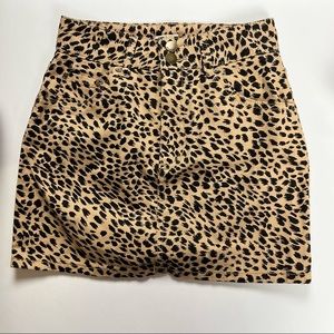 Billabong Cheetah print mini skirt size 26 or 4 jean like material